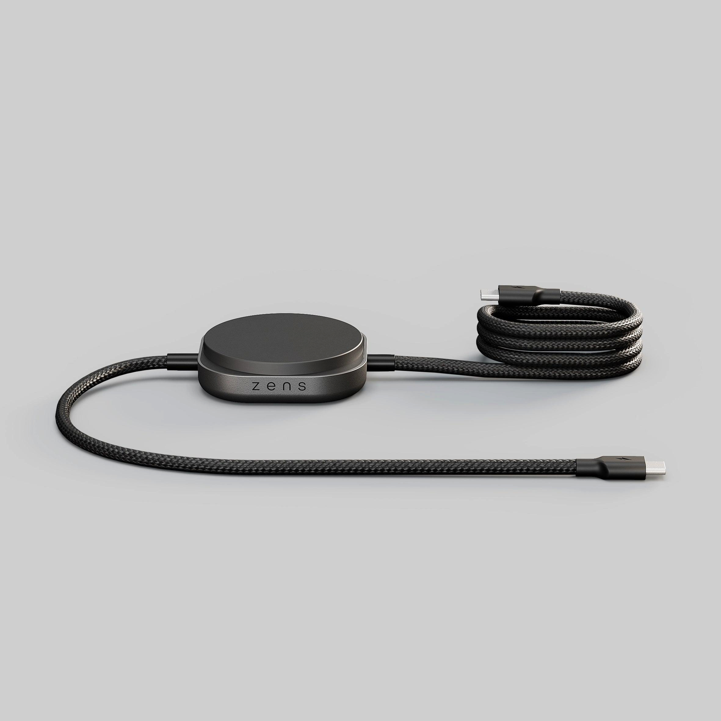 Ein schwarzes Ladekabel mit USB-C-Anschluss und einem runden Sockel mit Zens-Logo.