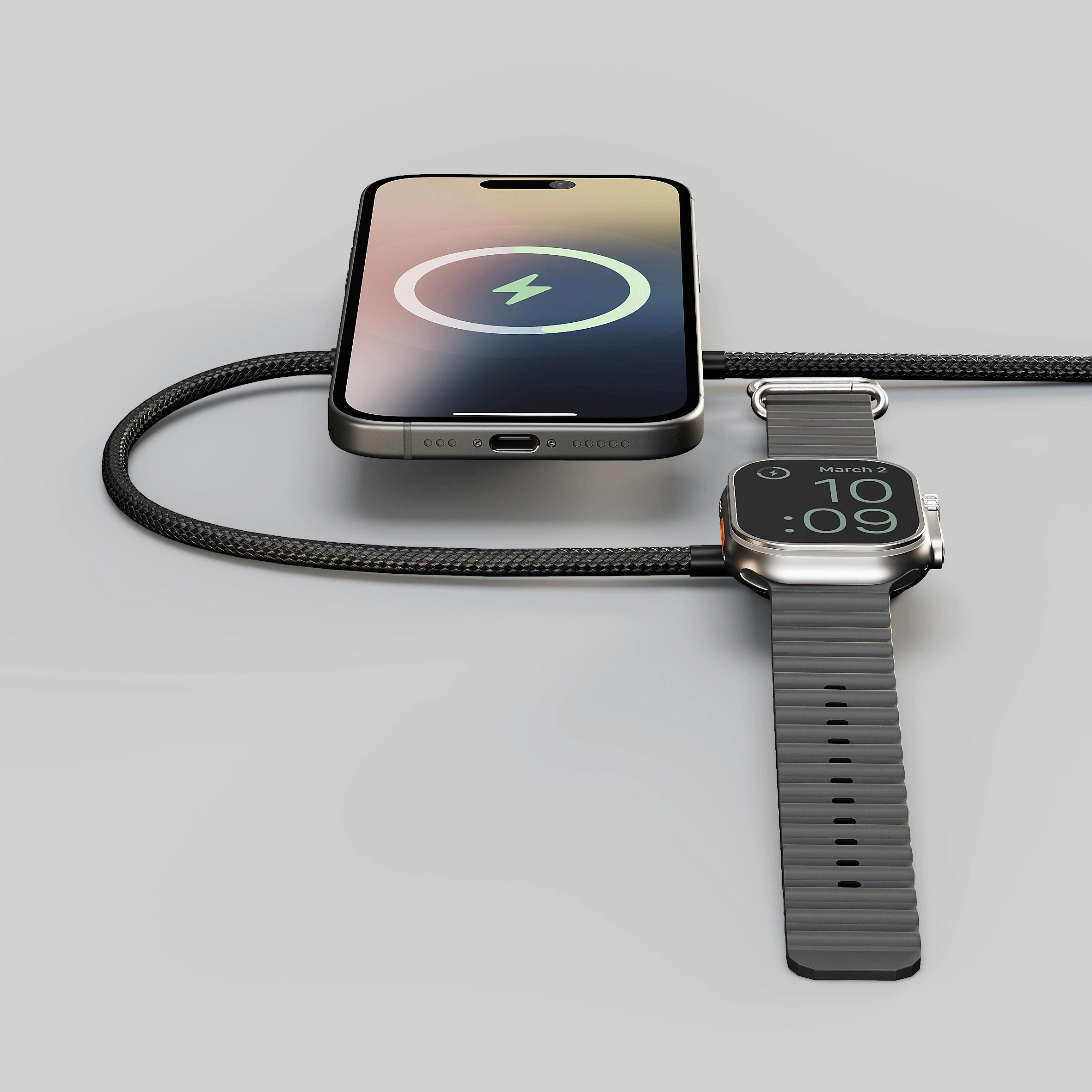 Ein Smartphone und eine Smartwatch werden über ein geflochtenes Kabel geladen.