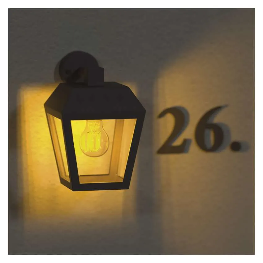 Egy fekete lámpatest izzóval megvilágít egy falat a 26-os számmal.