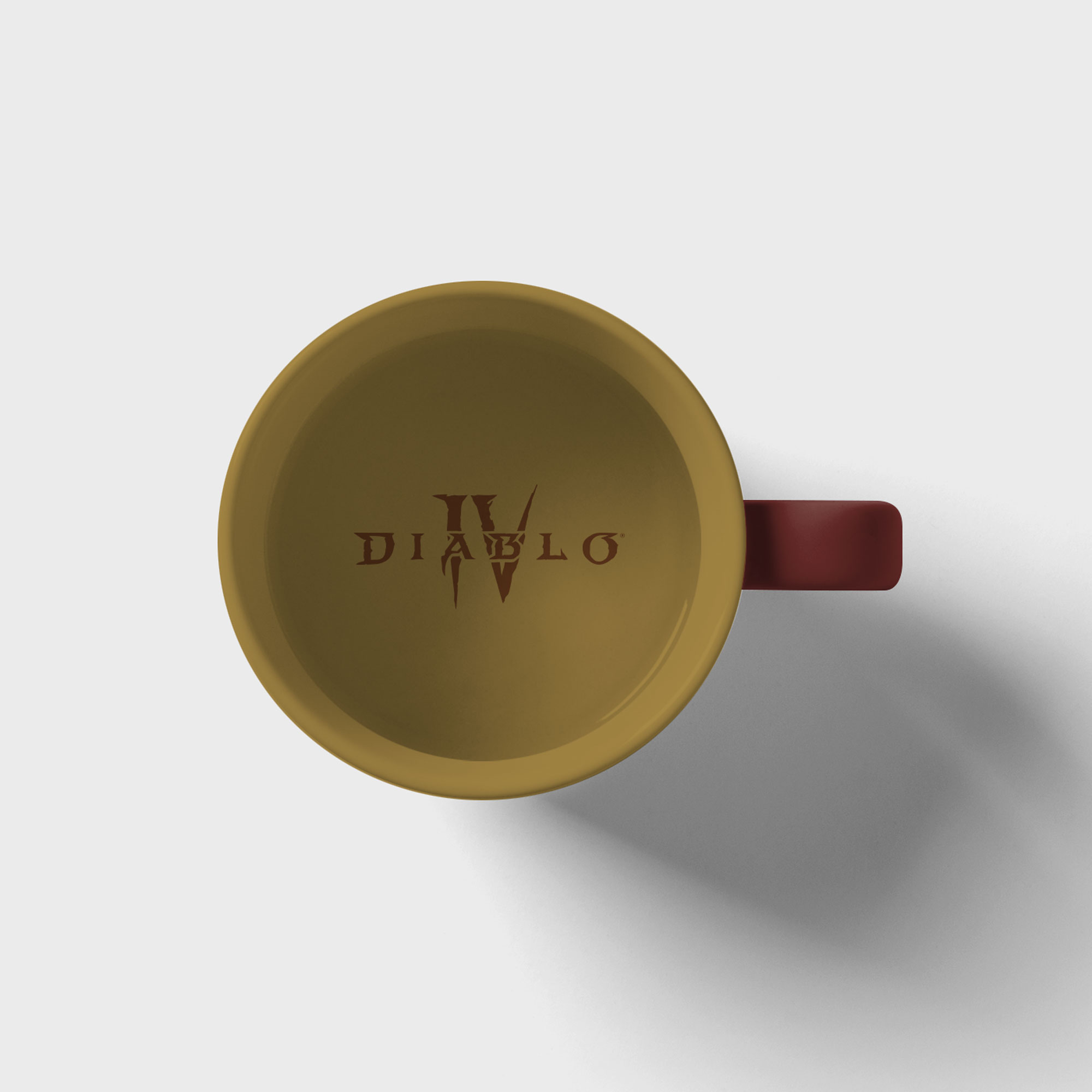 Sárga bögre Diablo IV logóval és piros füllel.