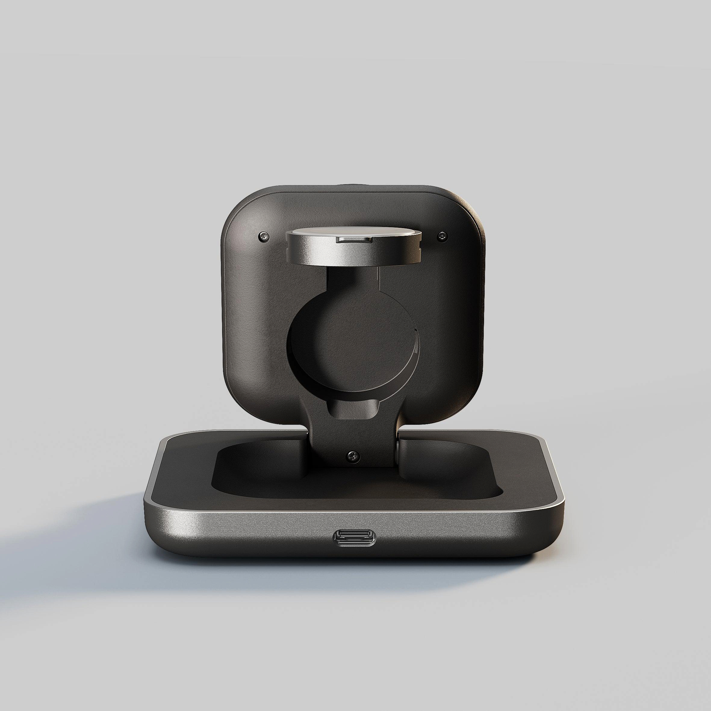 Ein dunkler Ladeständer mit einem USB-C-Anschluss und einem kreisförmigen Ausschnitt.