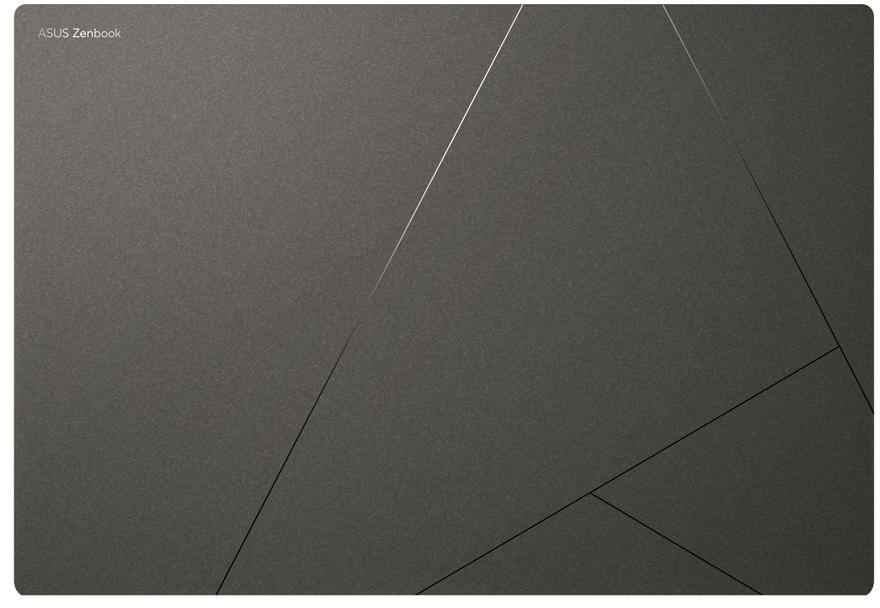 Szürke felület geometrikus vonalakkal és ASUS Zenbook logóval.