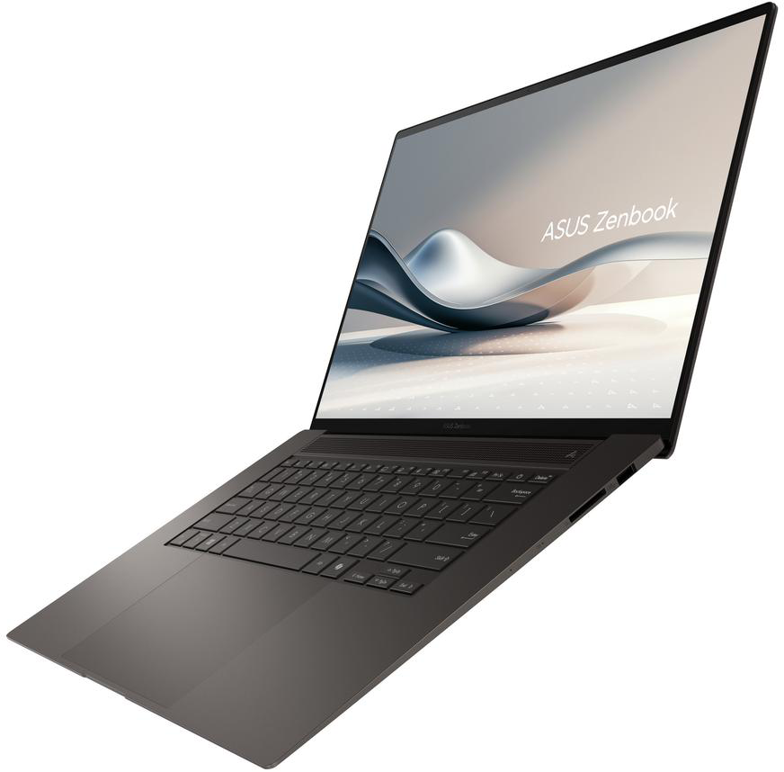 Egy sötétszürke ASUS Zenbook laptop nyitva van, képernyőjén absztrakt hullámok láthatók.