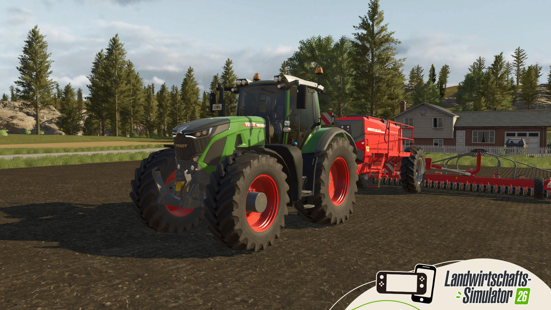Ein grüner Fendt-Traktor mit rotem Sämaschinenaufsatz steht auf einem Feldweg.