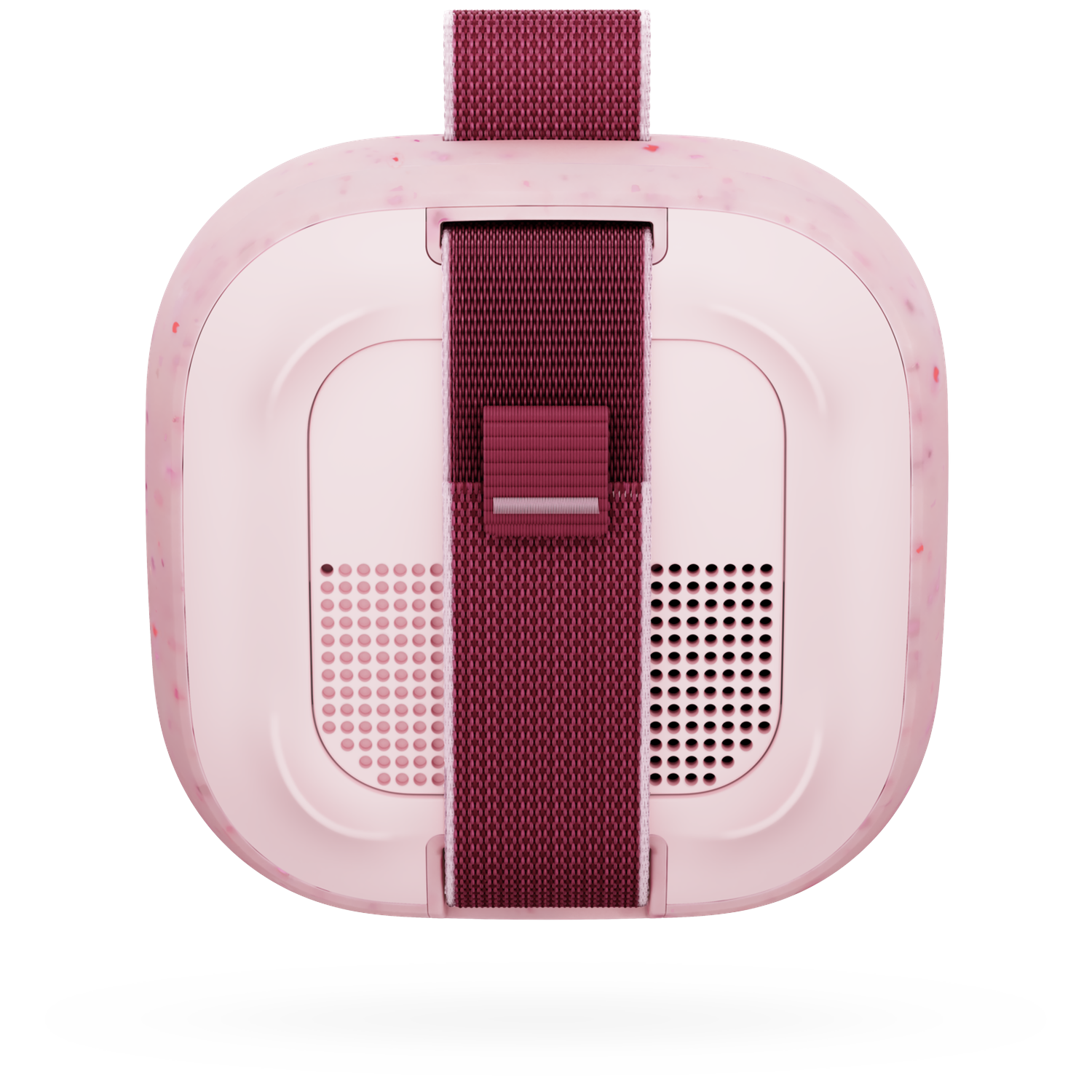 Een roze headset met een kastanjebruine band, getoond tegen een zwarte achtergrond.