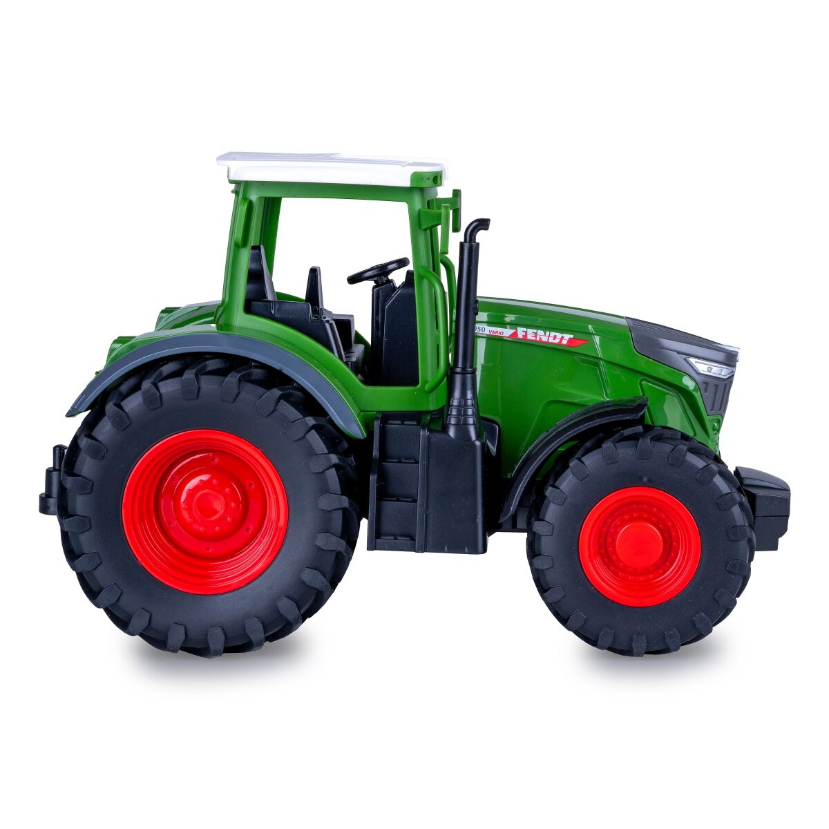 Zöld játék traktor piros felnikkel és fehér tetővel.