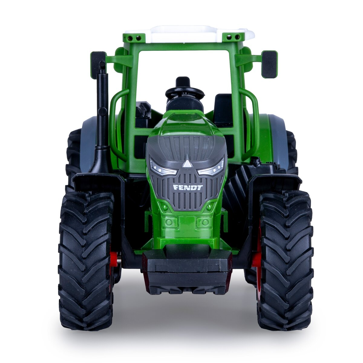 Zöld játék traktor nagy kerekekkel, Fendt logóval.