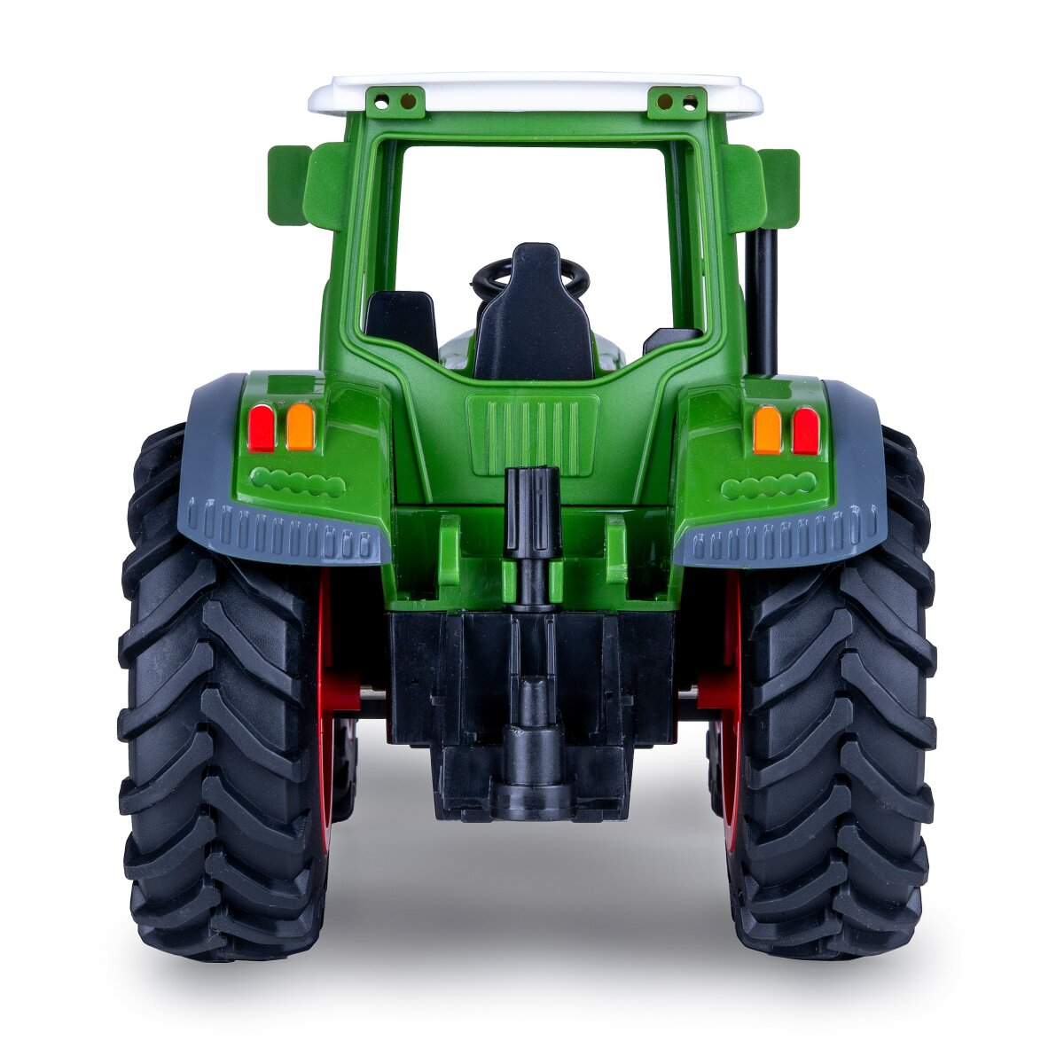 Zöld játék traktor nagy kerekekkel, hátulról nézve.