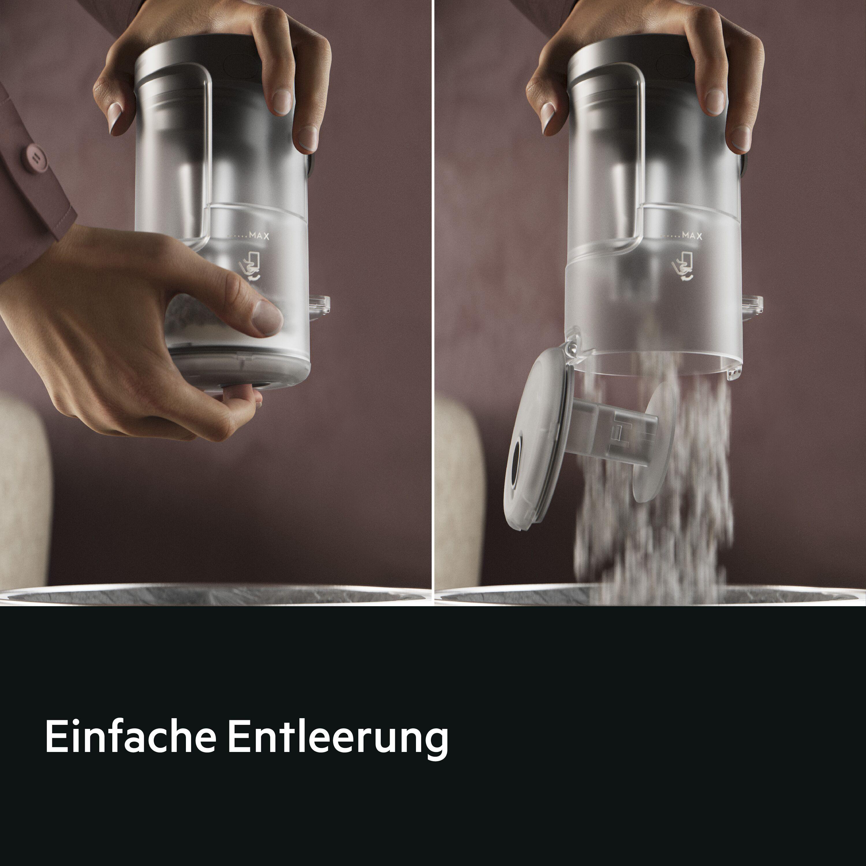 Ein Behälter wird entleert, Staub fällt heraus. Einfache Entleerung.