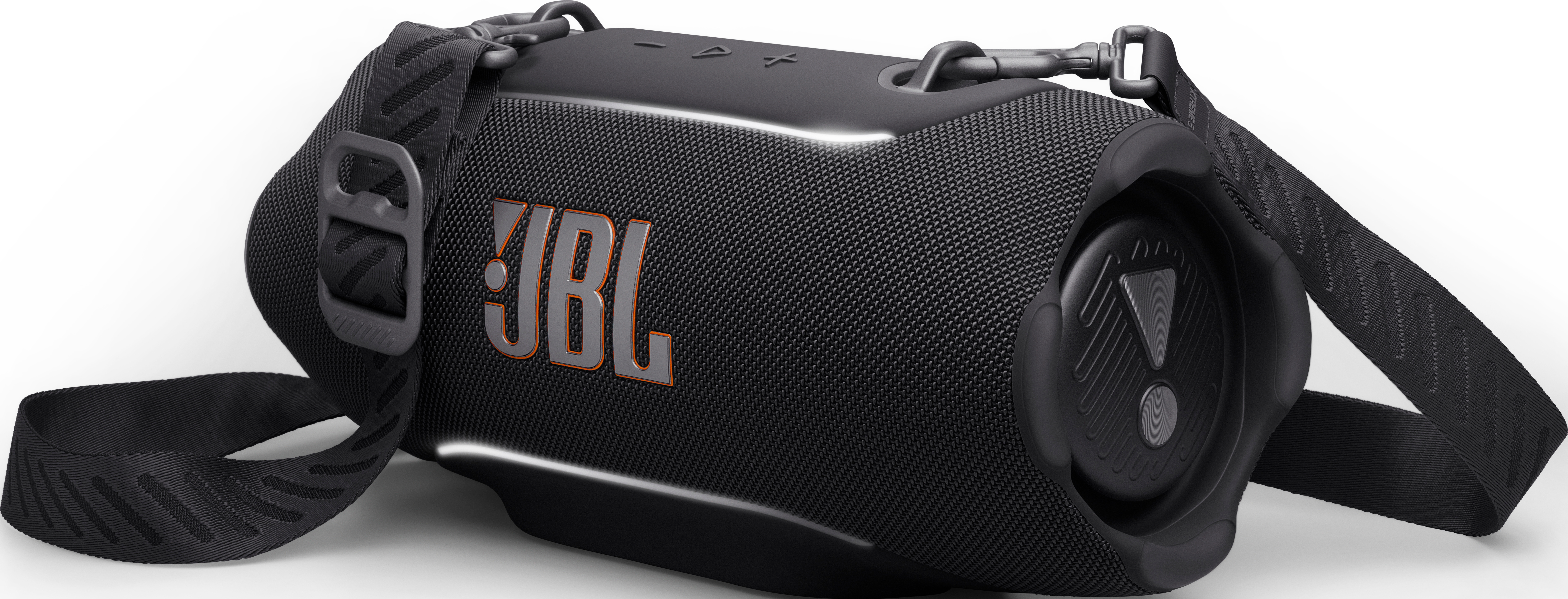 Enceinte JBL noire avec une sangle de transport sur fond blanc.