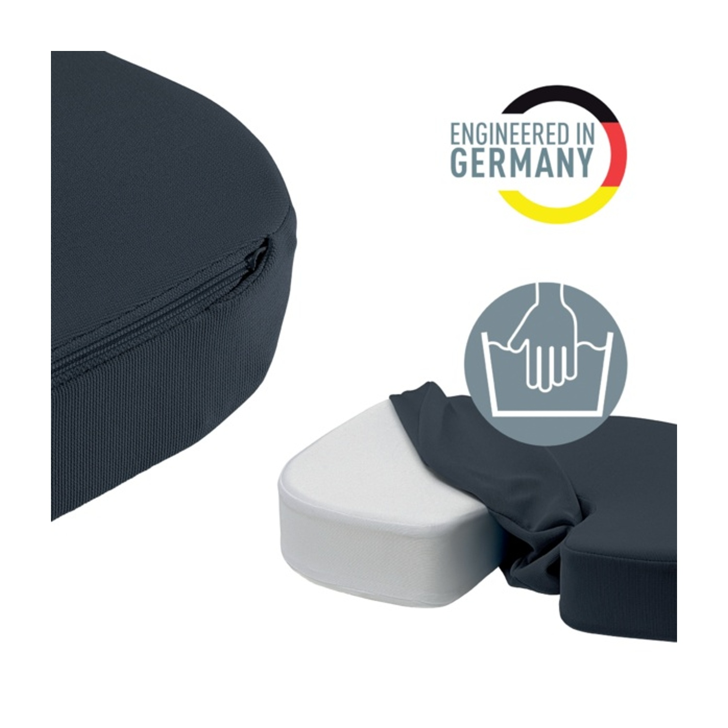 Cuscino grigio scuro con cerniera, logo "Engineered in Germany" e simbolo lavaggio a mano.