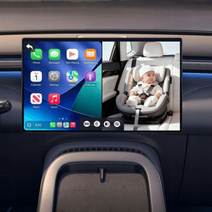 Dziecko w foteliku samochodowym wyświetlane na ekranie.