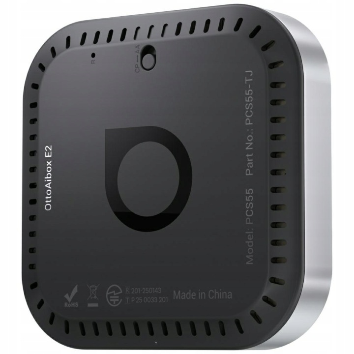 Czarno-srebrne urządzenie OttoAibox E2 z otworami wentylacyjnymi.