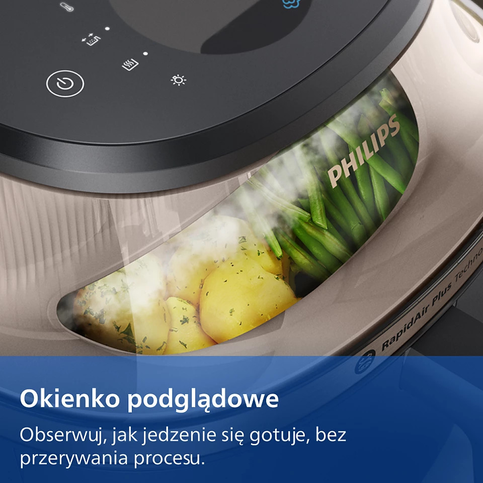 Frytkownica Philips z oknem podglądowym ukazującym parujące ziemniaki i fasolkę szparagową.
