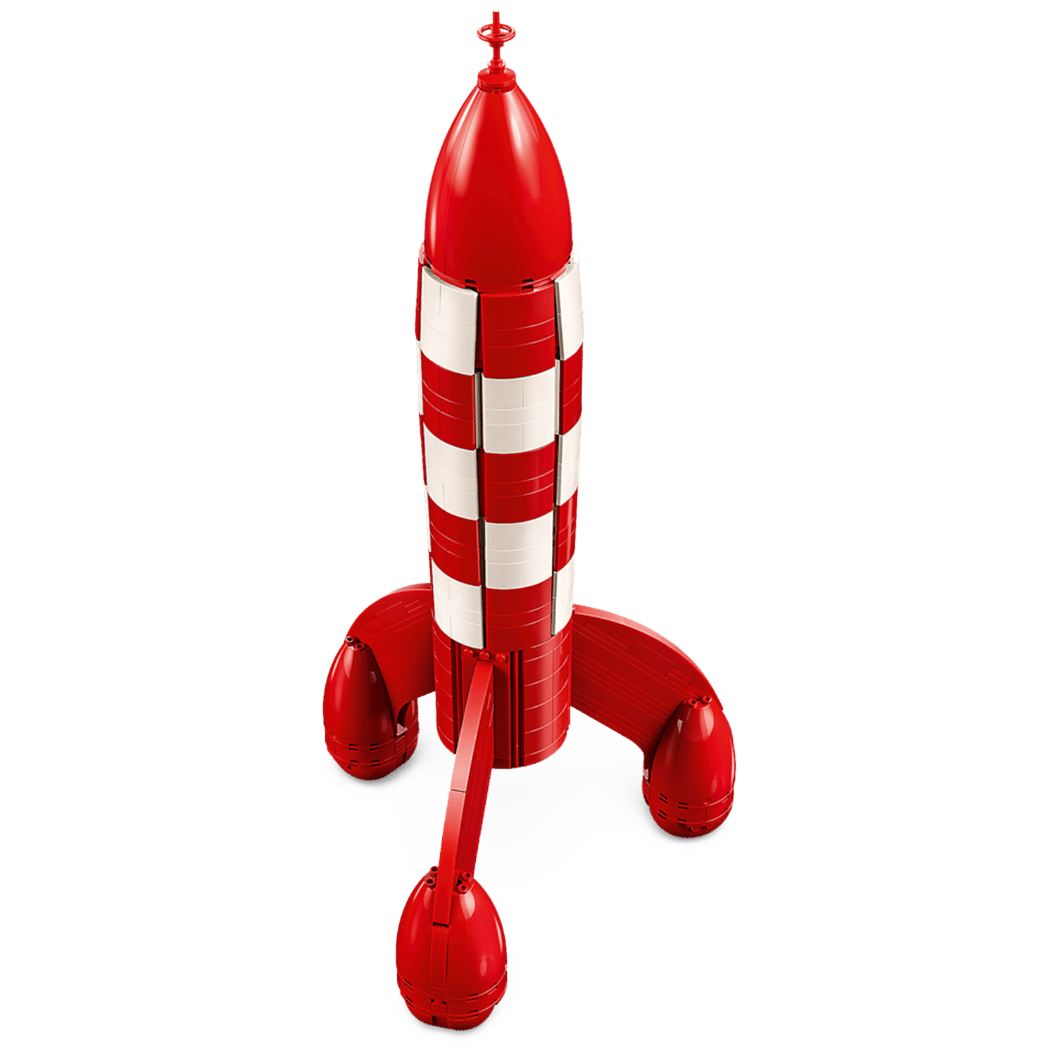 A red and white Lego rocket model stands on three legs.