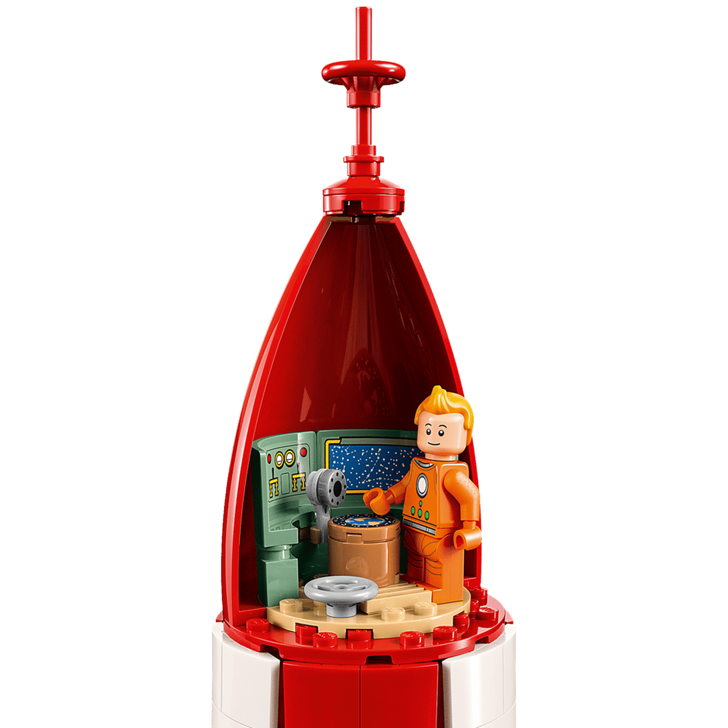 A Lego astronaut in an orange suit stands by a rocket with a control panel inside.