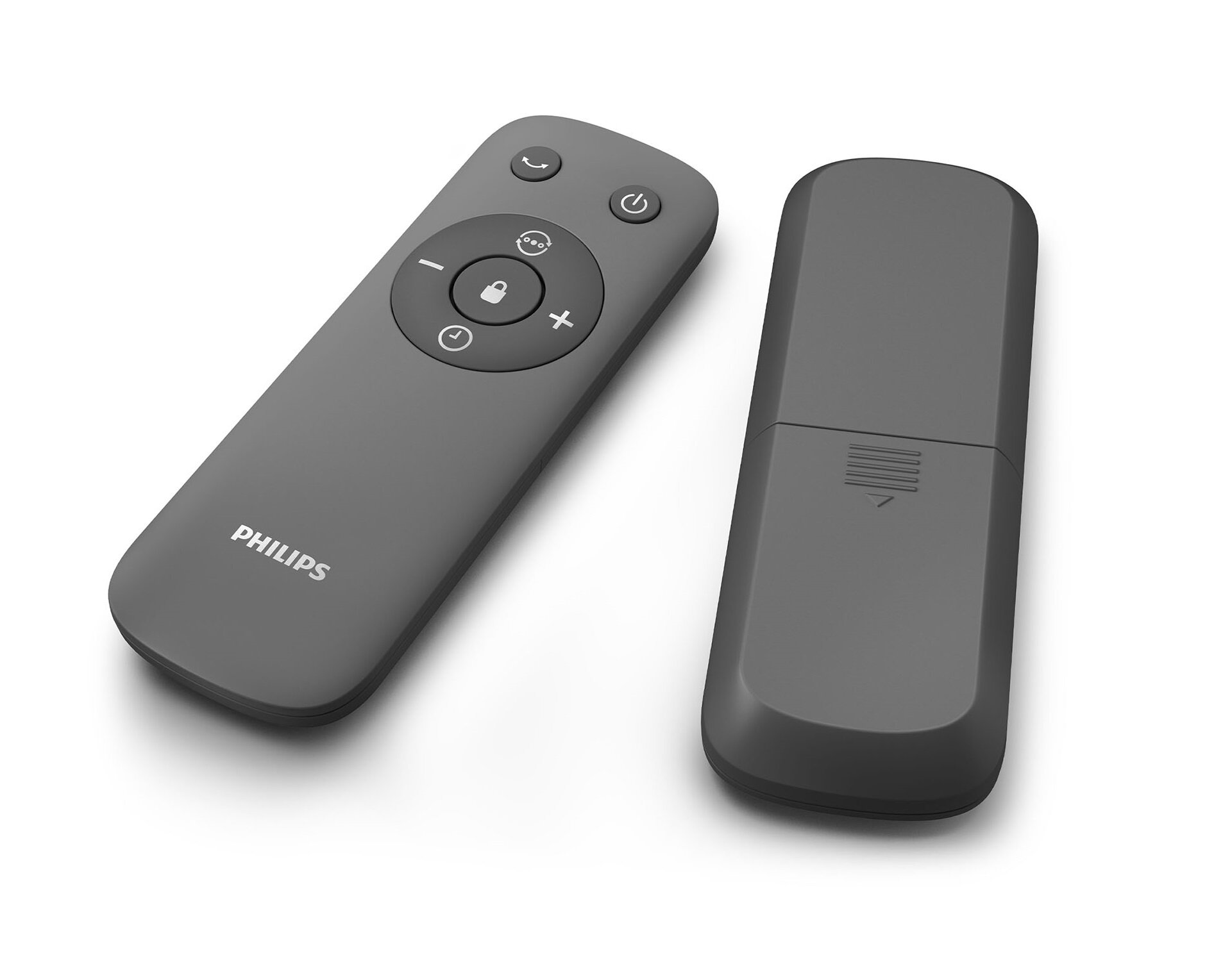 Dwa szare piloty leżą obok siebie na białym tle.