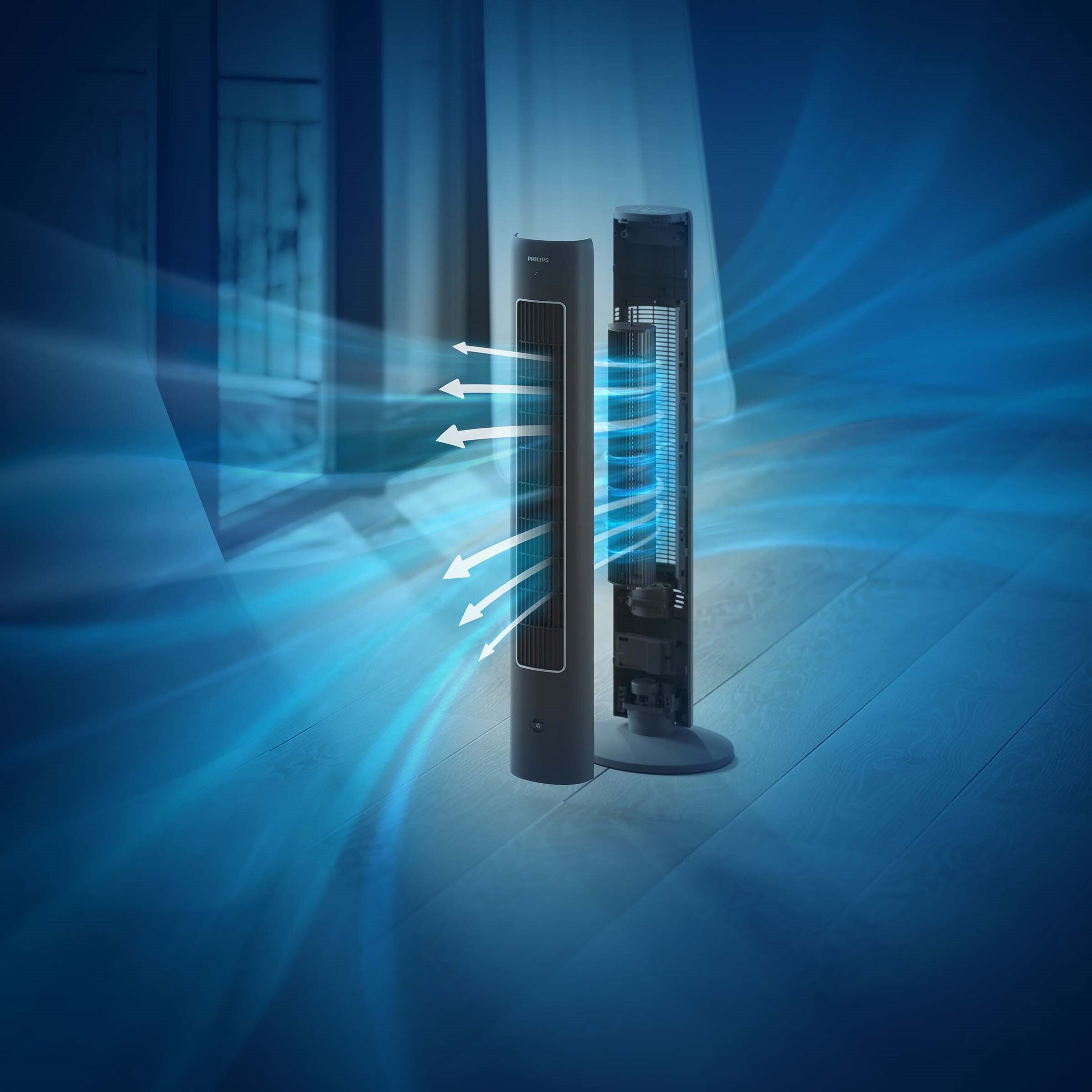 Czarny wentylator wieżowy z odsłoniętym wnętrzem na drewnianej podłodze.