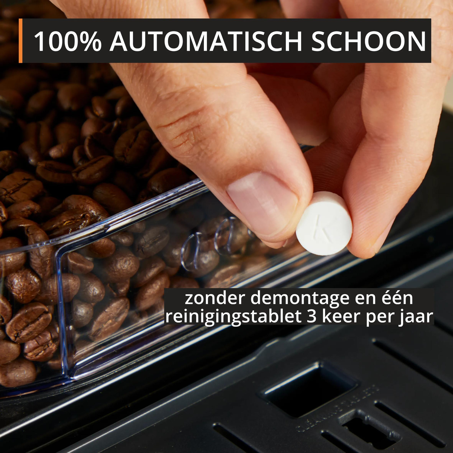 A hand holds a white cleaning tablet over coffee beans.