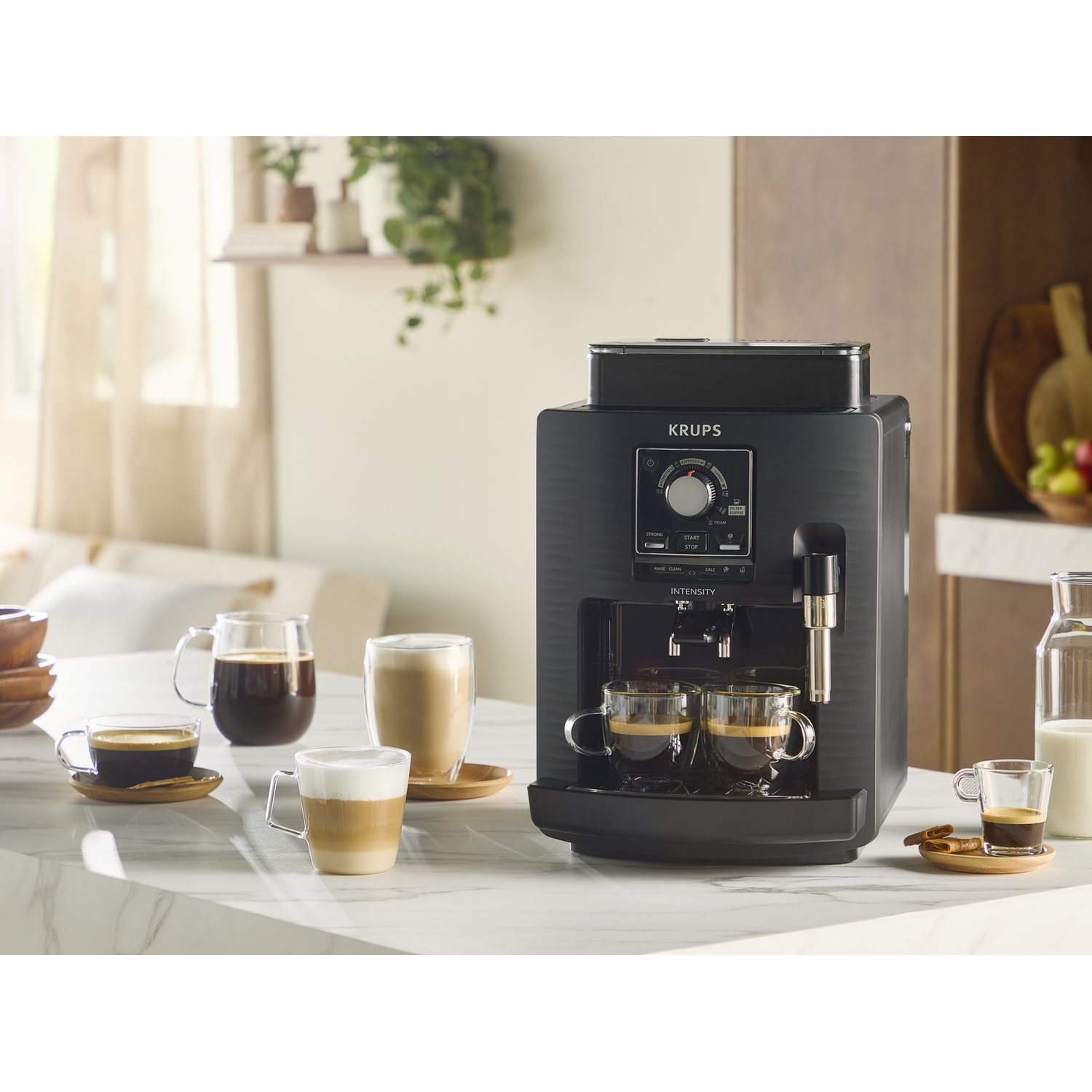 Black Krups espresso machine brewing two cups. Coffee cups with espresso and latte art.
