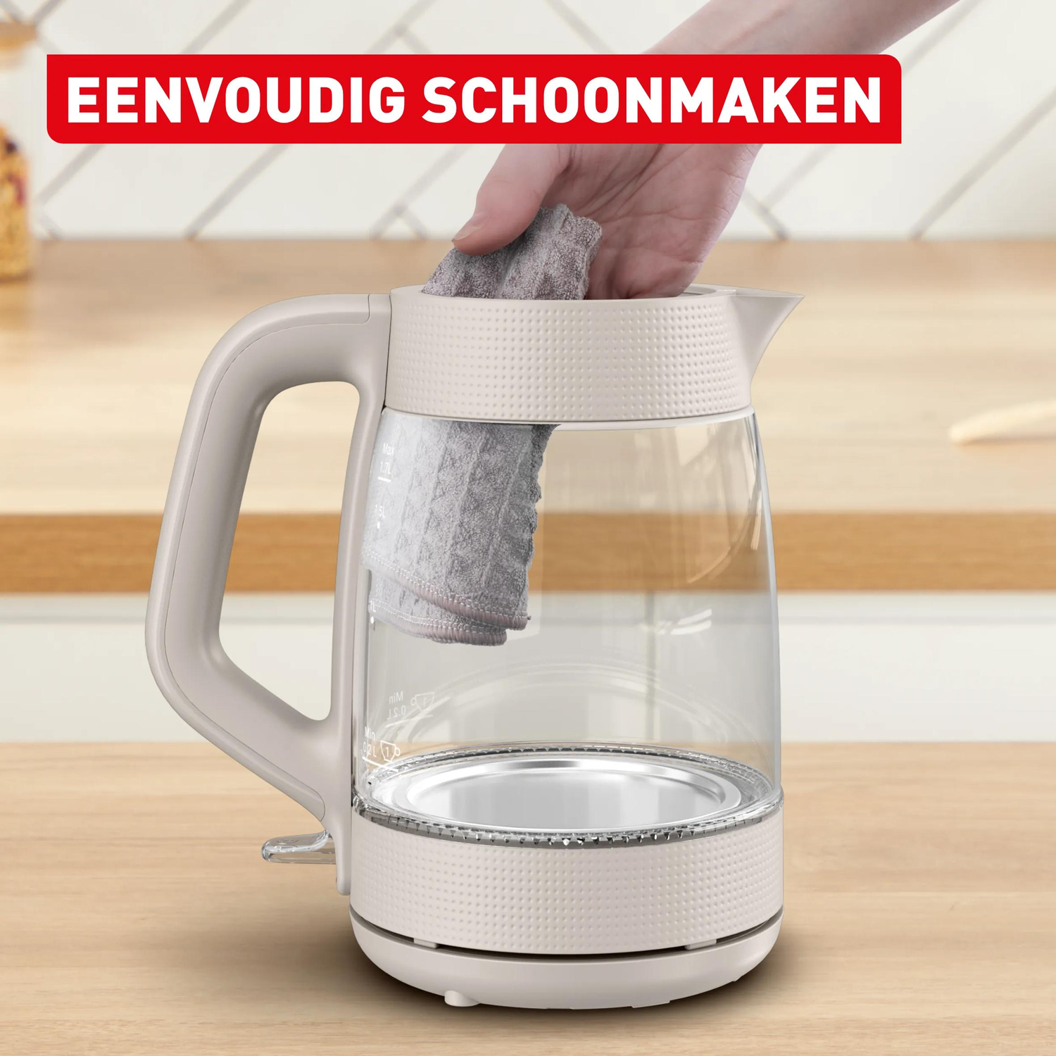 A hand cleans a kettle with a cloth. Text: Easy cleaning.