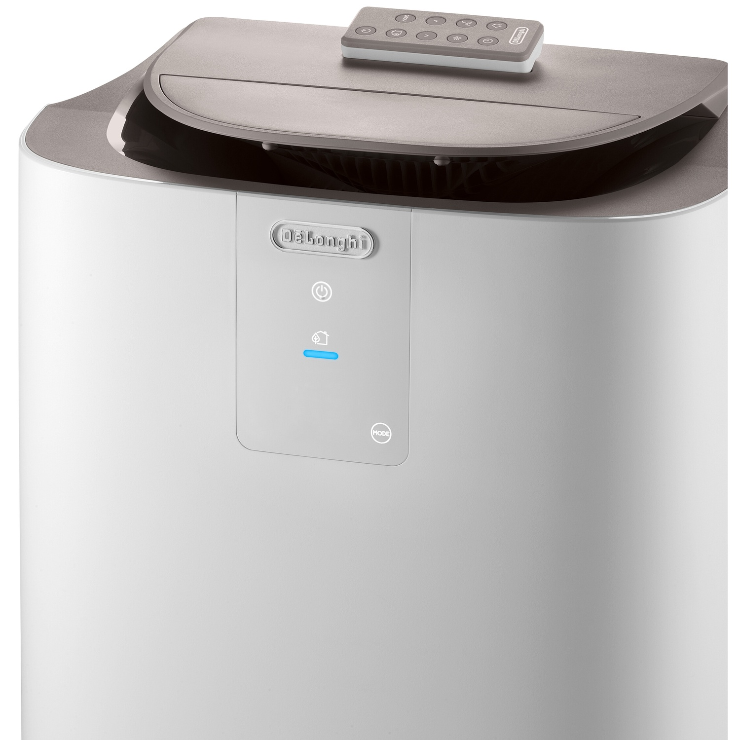A white air purifier with a remote control on top.