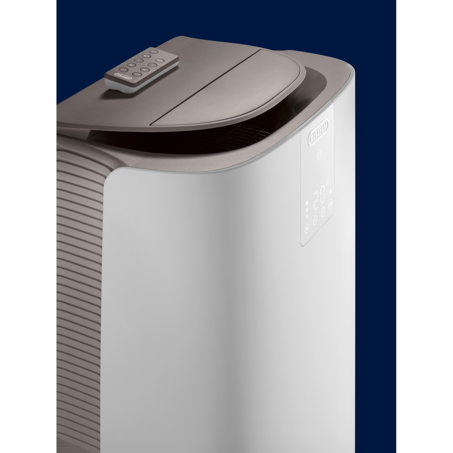 A white air purifier with remote on lid and digital display.