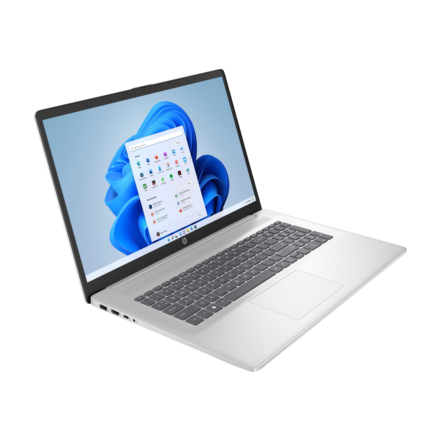 Un laptop argentato con il menu Start di Windows 11 sullo schermo.