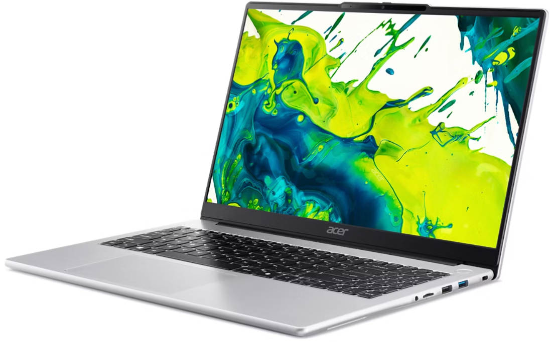 Egy nyitott ezüst laptop színes splash art háttérképpel a képernyőjén.