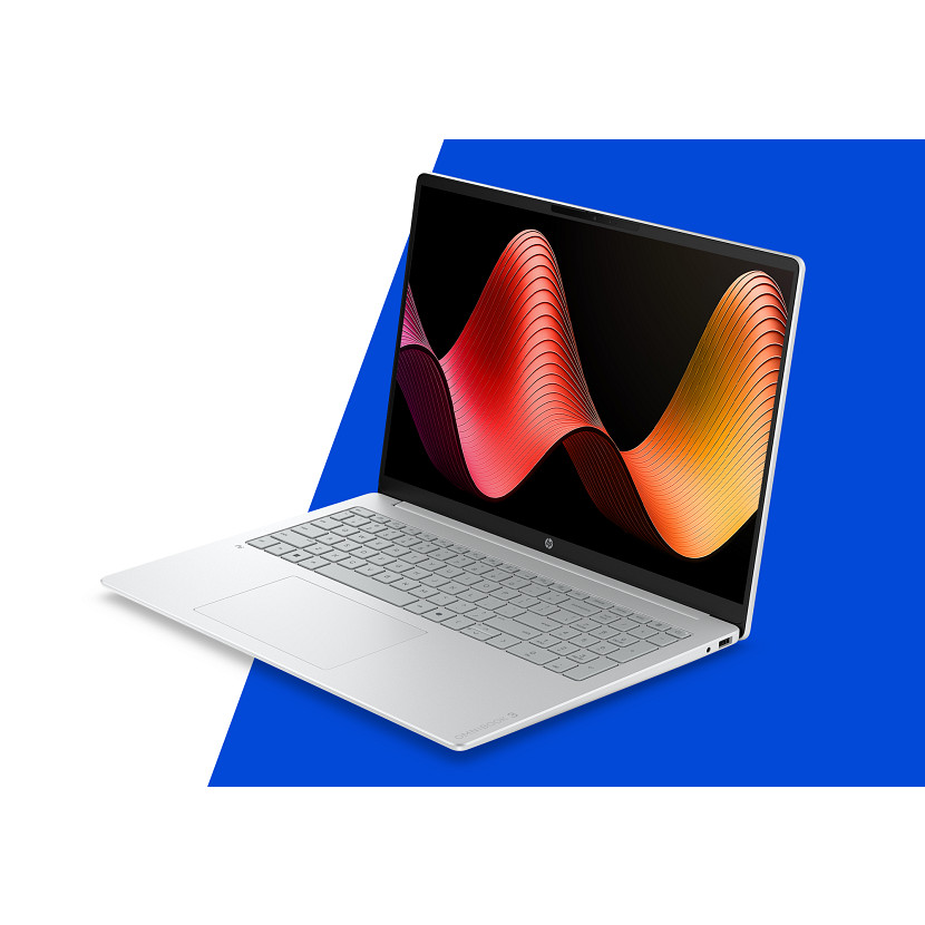 Ein silberner Laptop mit einem bunten Wellenmuster auf dem Bildschirm, auf weiß-blauem Hintergrund.