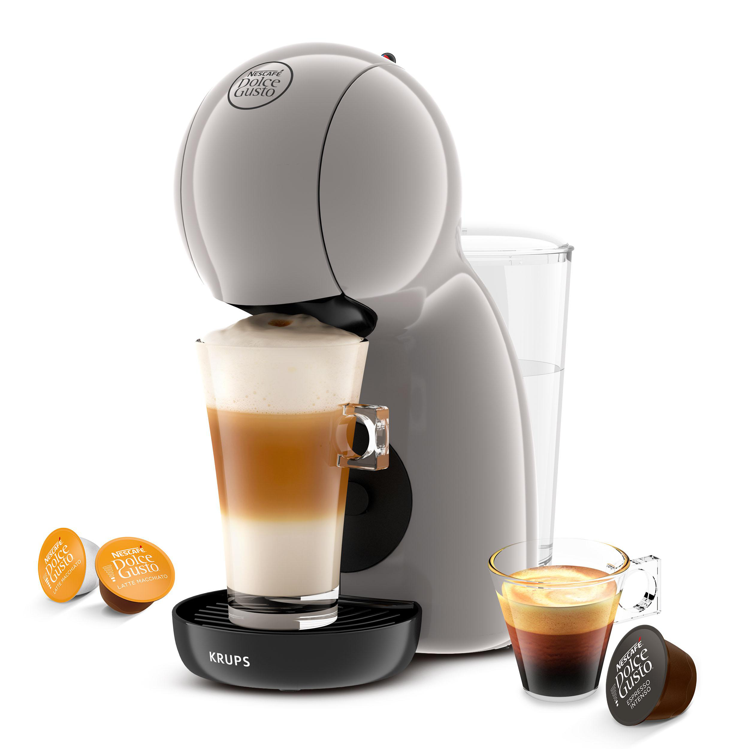 Graue Kaffeemaschine mit zwei zubereiteten Getränken und Kaffeekapseln.