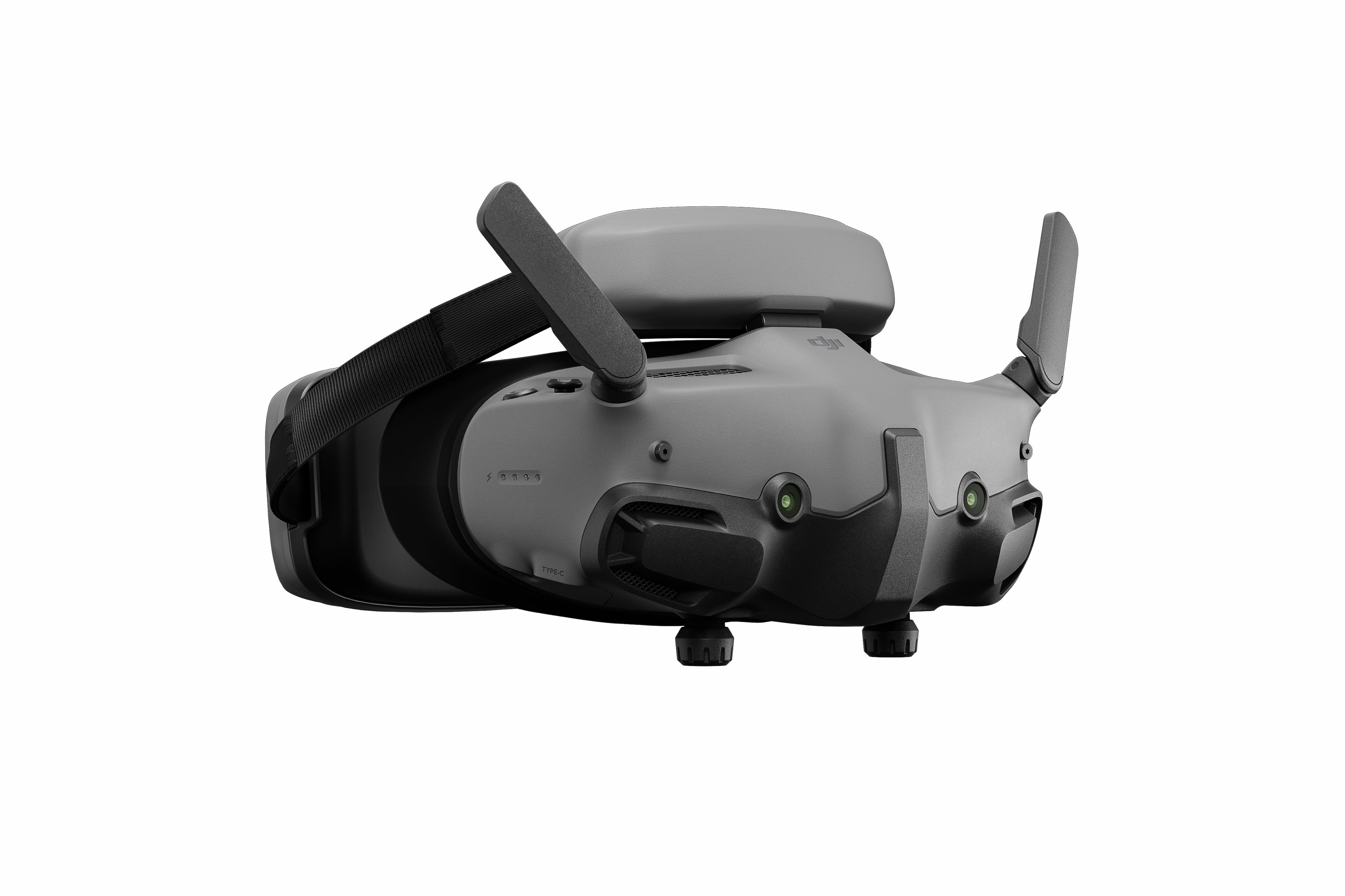 Graue DJI FPV Brille mit Antennen und Kameras auf weißem Hintergrund.