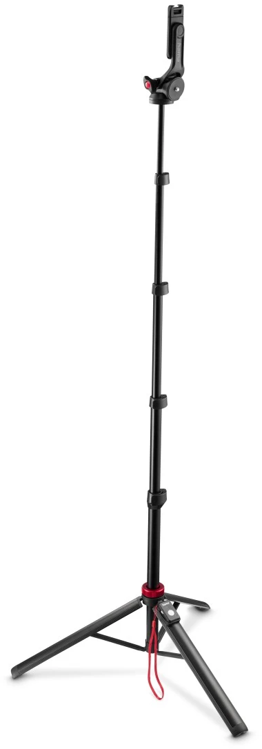 Un treppiede nero per fotocamera con base a tre gambe e supporto per telefono.