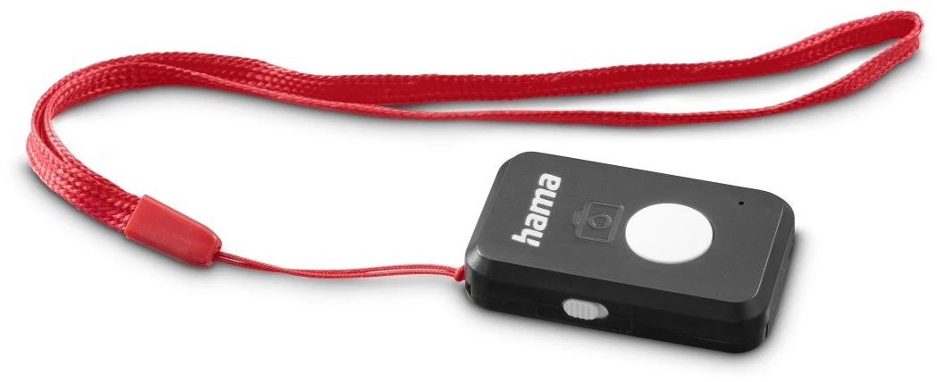 Déclencheur à distance Hama noir avec dragonne rouge et bouton blanc sur fond blanc.
