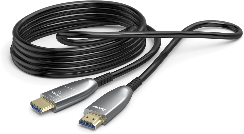 Un câble HDMI noir enroulé avec des connecteurs dorés sur fond blanc.