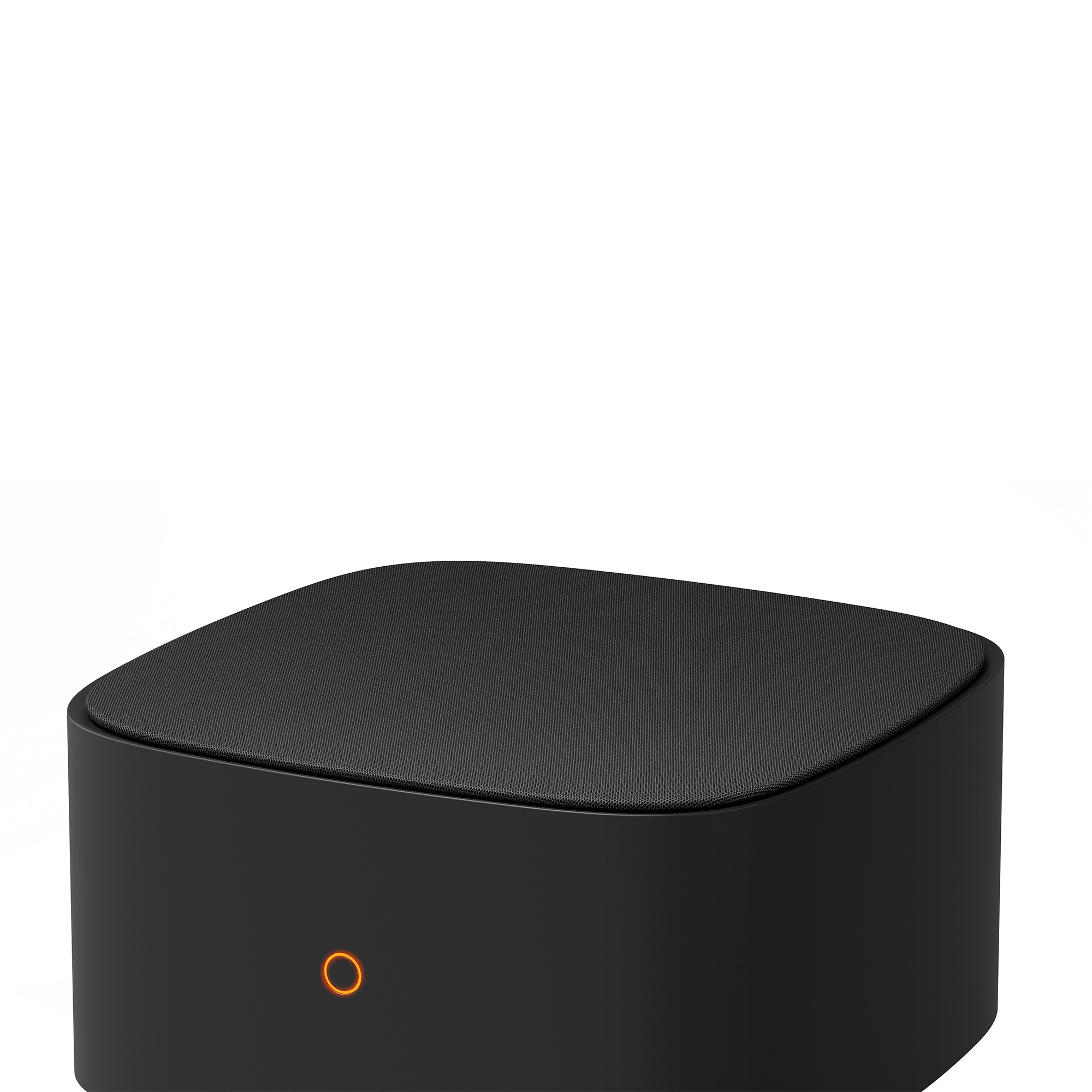 Altavoz negro con luz indicadora naranja circular. Superficie superior texturizada.