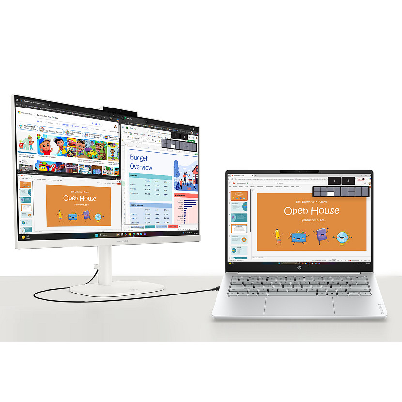 Ein Laptop und ein Monitor zeigen Präsentationen über „Open House“ und „Budget Overview“.