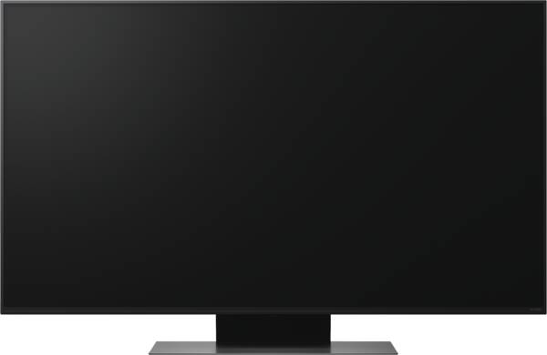 Ein schwarzer Fernseher mit einem schmalen Standfuß, isoliert auf weißem Hintergrund.