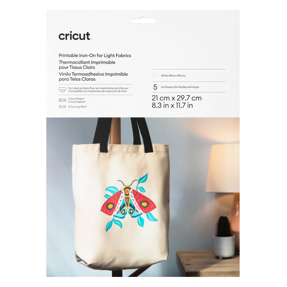 Bolsa tote Cricut con diseño de mariposa y embalaje de producto al frente.