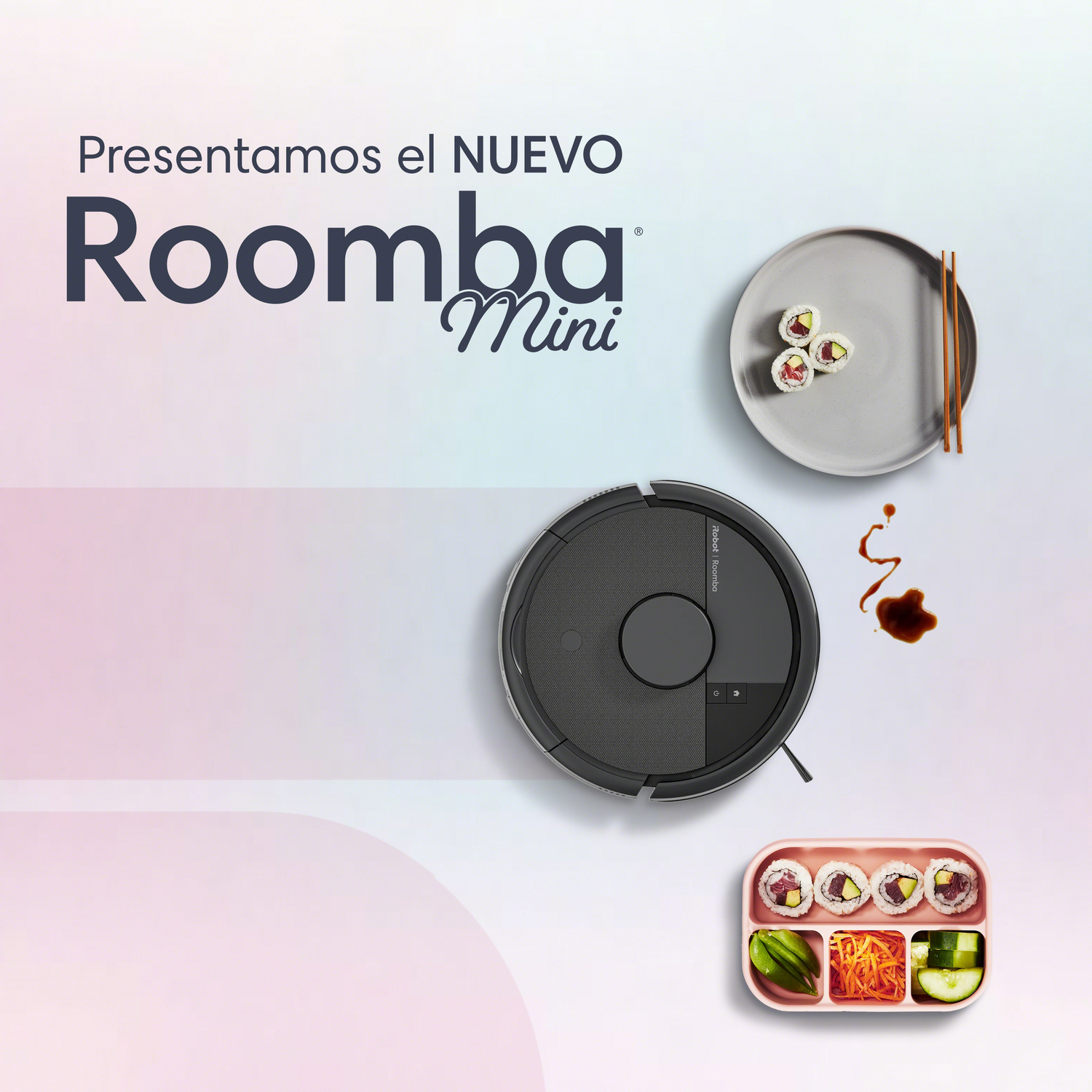 Un robot aspirador Roomba junto a sushi y salsa de soja.