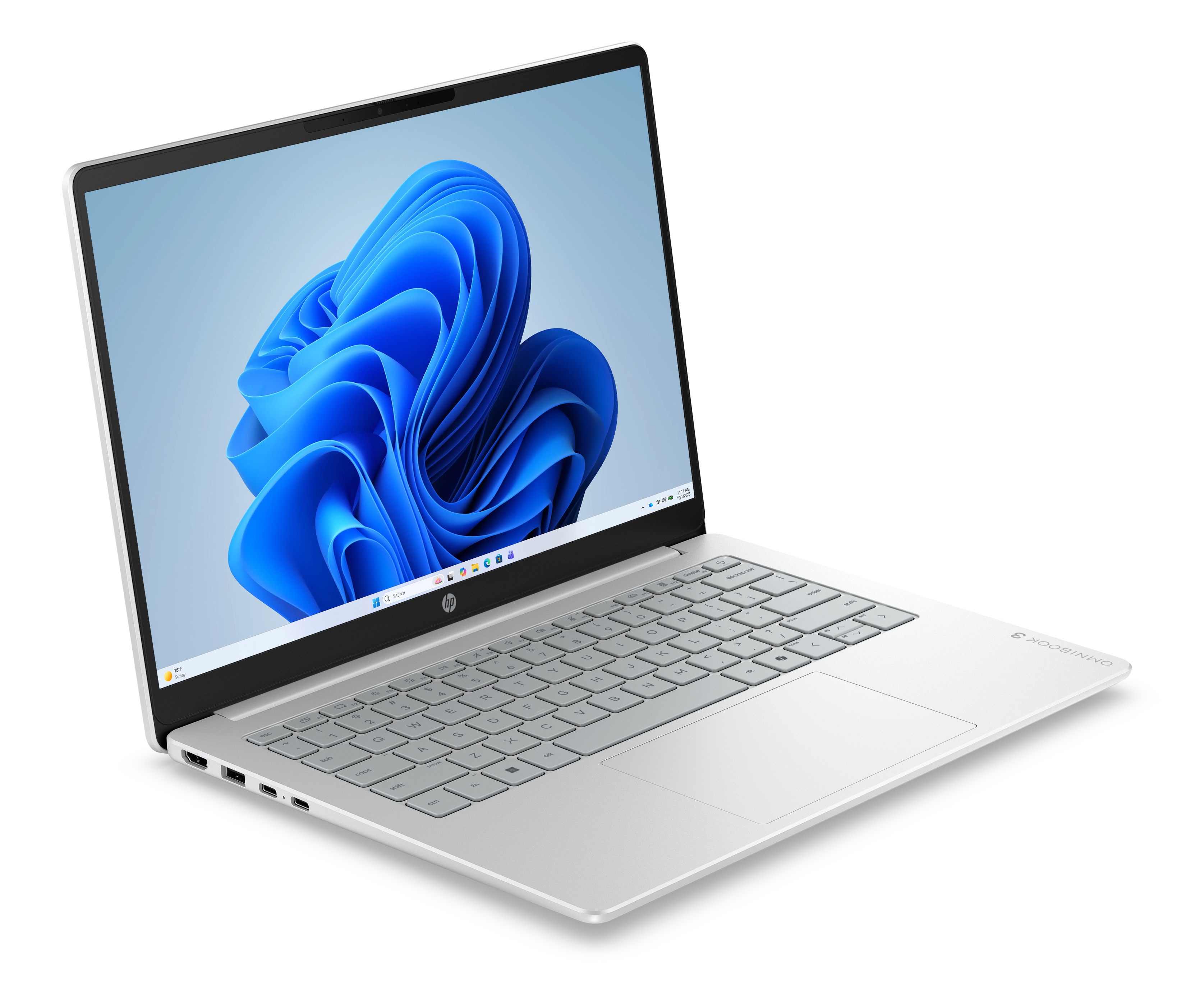 Ein silberner Laptop mit beleuchteter Tastatur und Windows-Hintergrundbild.