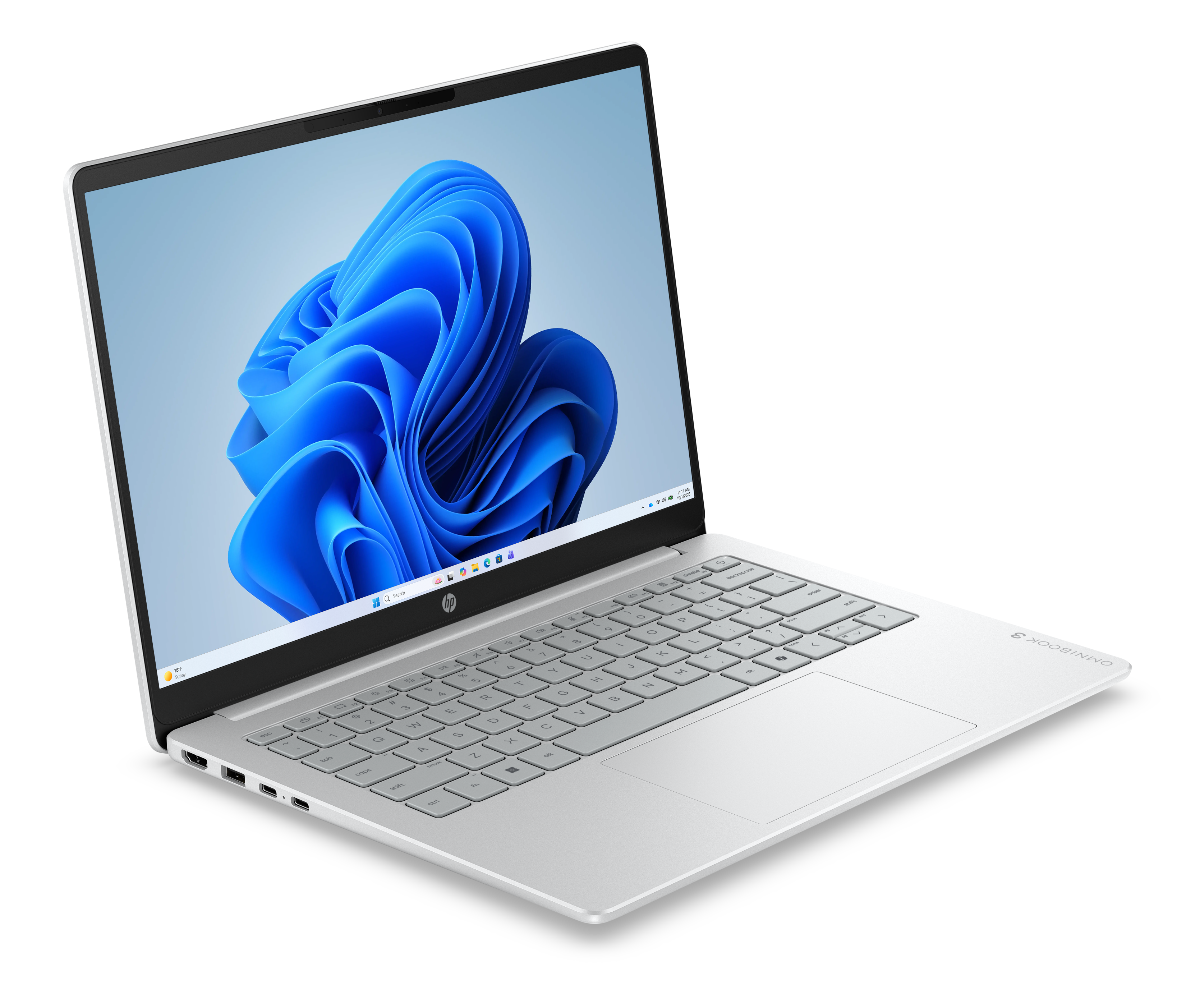 Ein geöffneter, silberner Laptop mit Windows 11-Hintergrund auf schwarzem Hintergrund.