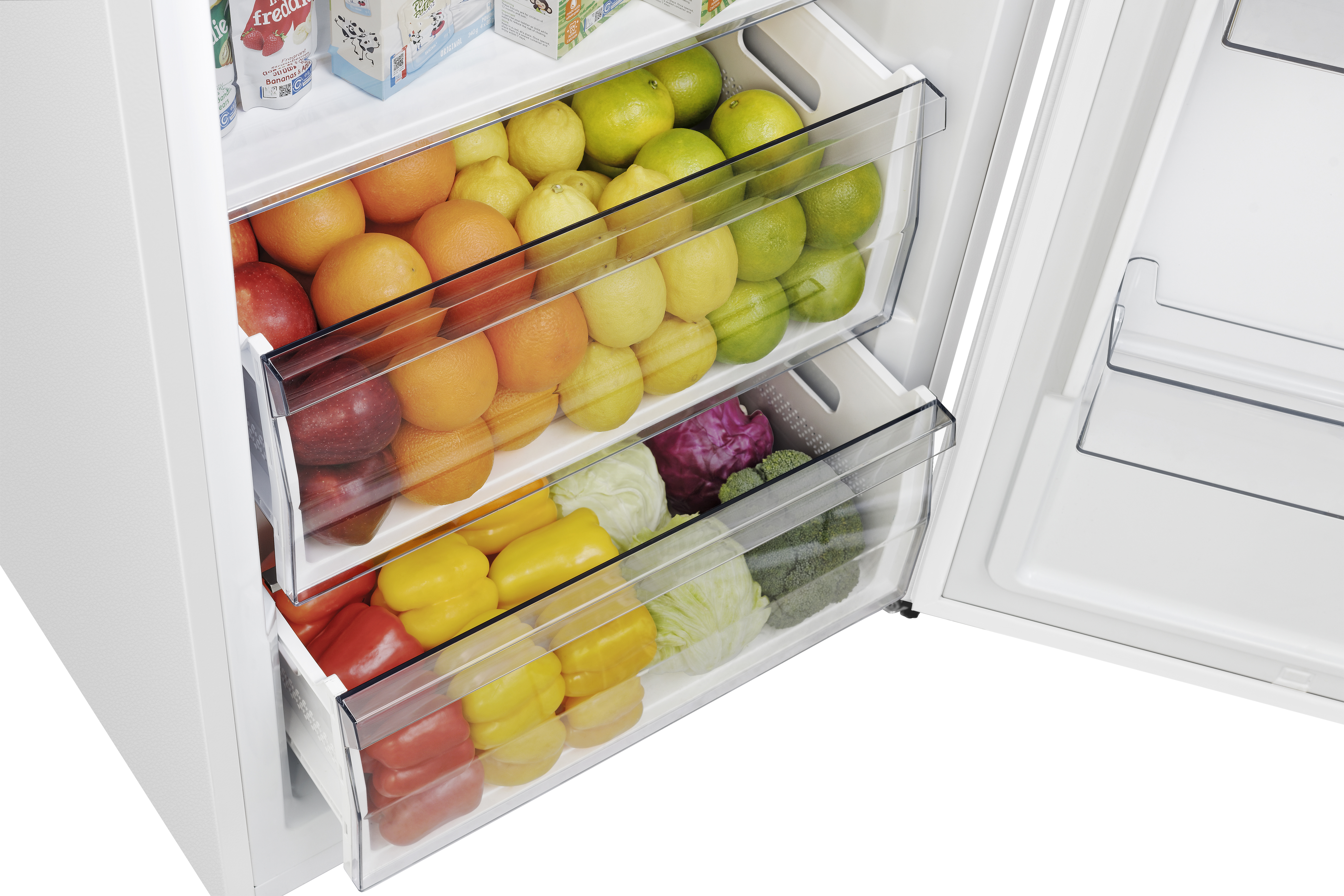 Ein weißer Kühlschrank mit zwei Schubladen, gefüllt mit Obst und Gemüse.