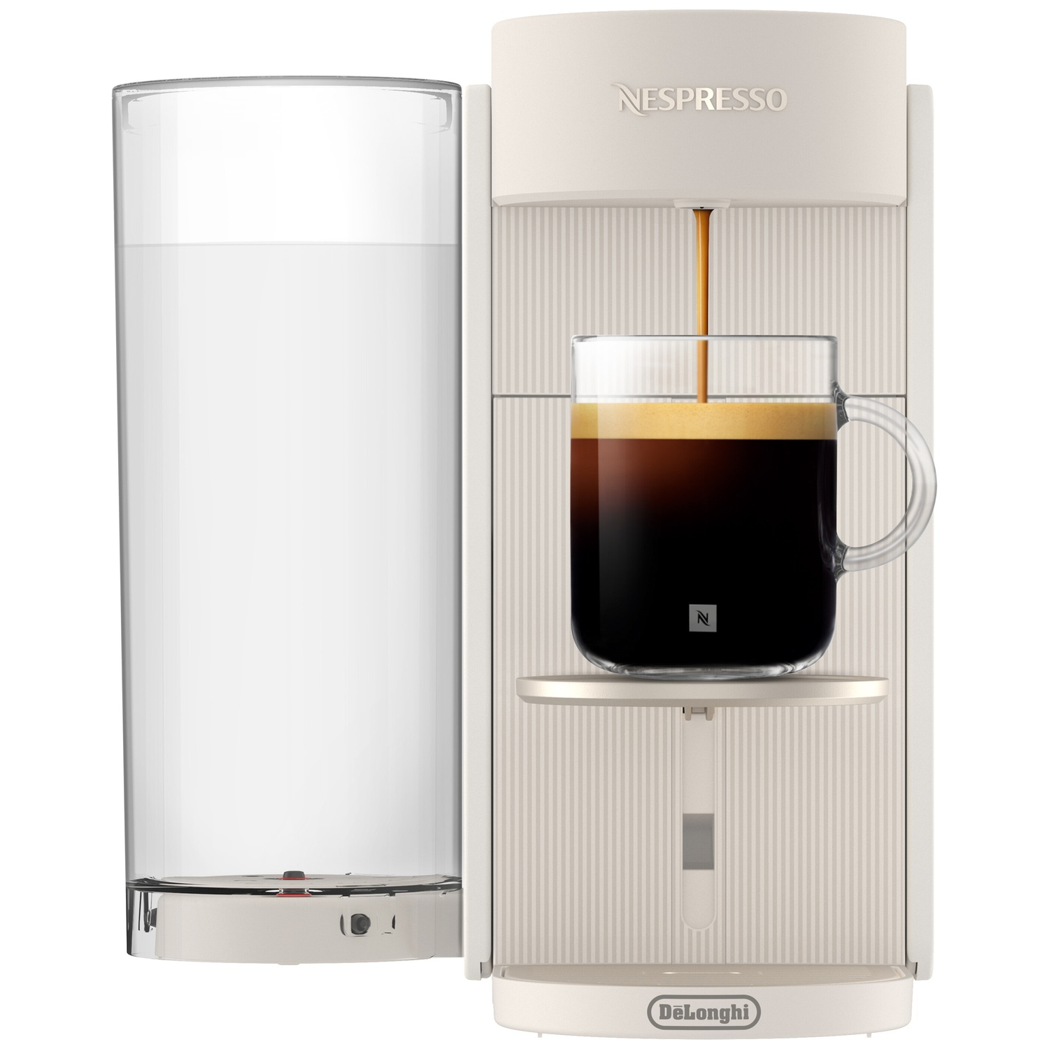 A white Nespresso machine brews coffee into a glass.