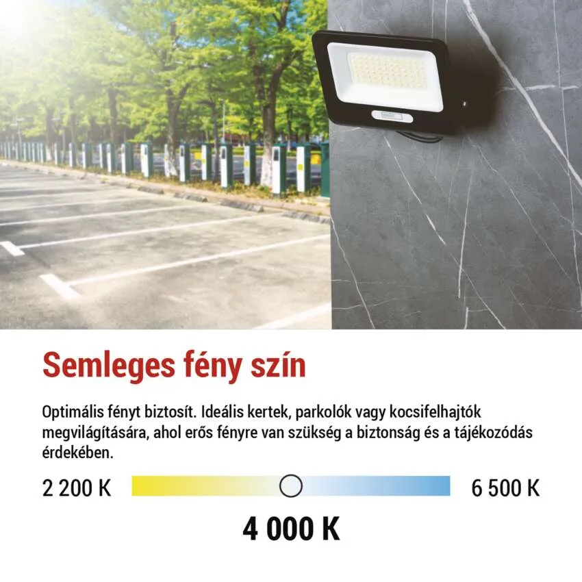 Fekete reflektor falon, fák melletti parkoló felett.