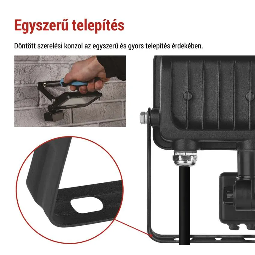 Férfi szerel fel lámpát téglafalra. A tartó részletes fotója.