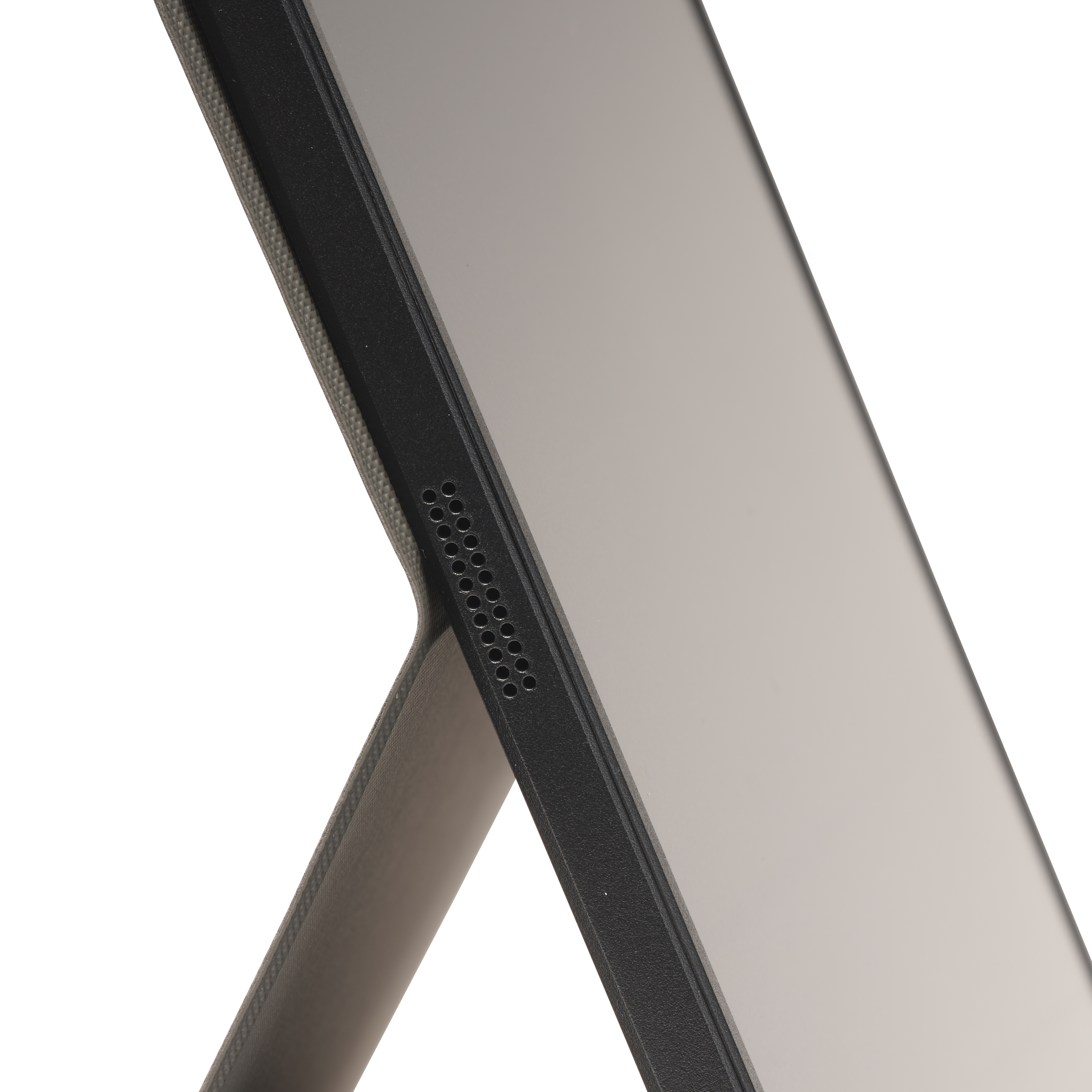 Graues Tablet mit schwarzem Rand und Lautsprechergitter, auf weißem Hintergrund.