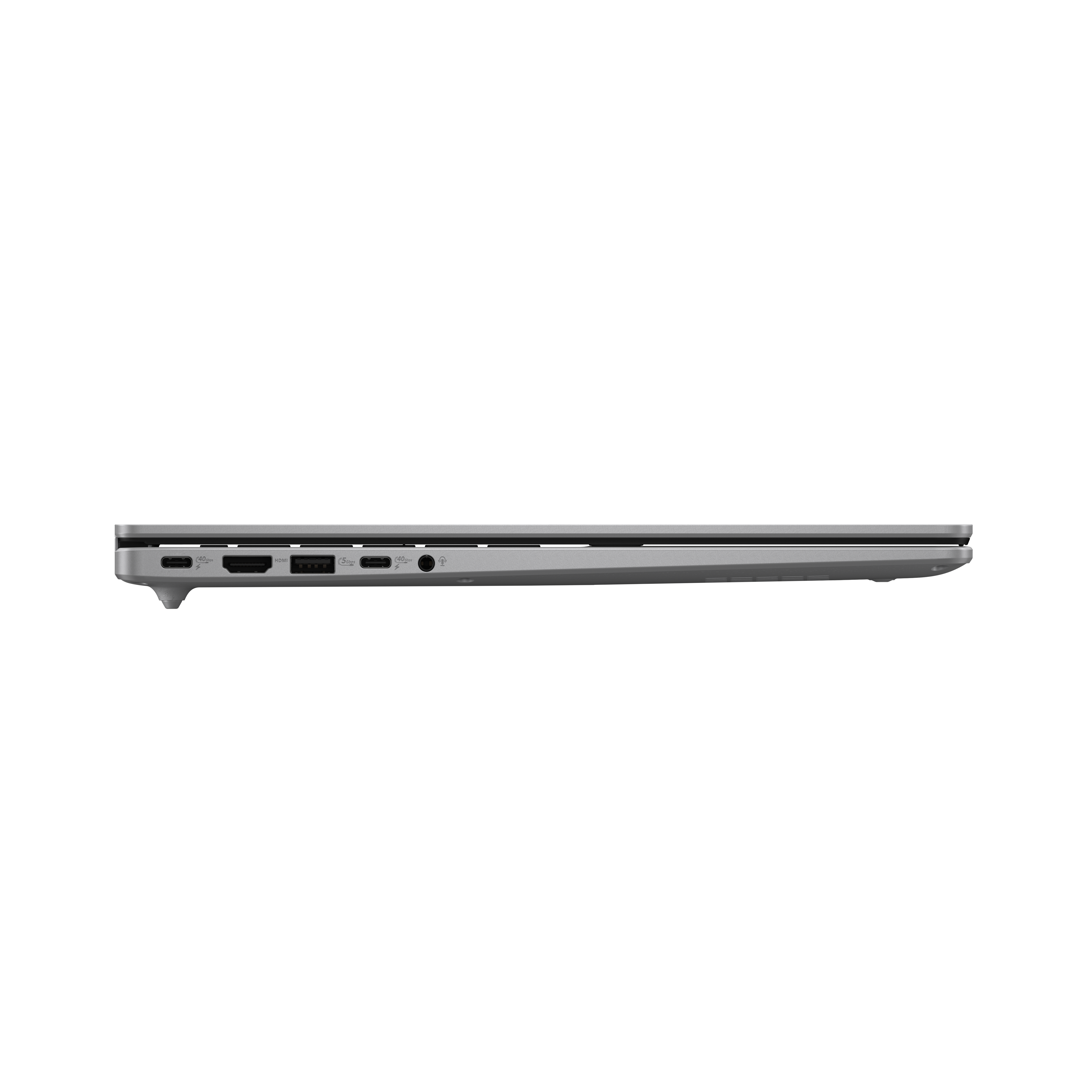 Srebrny port laptopa z USB-C, HDMI i gniazdem audio.