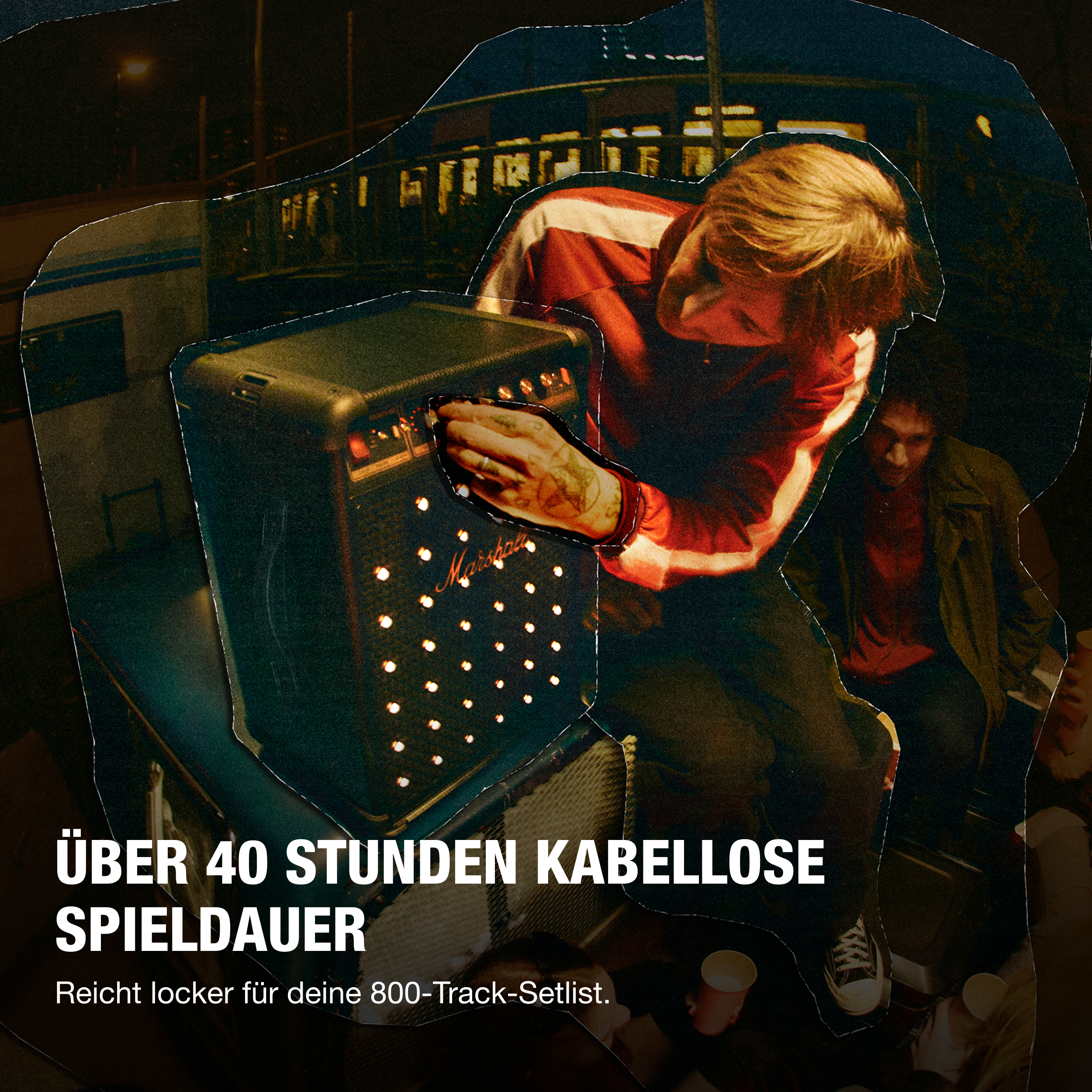 Ein Mann bedient einen Marshall Verstärker mit Lichtern nachts.