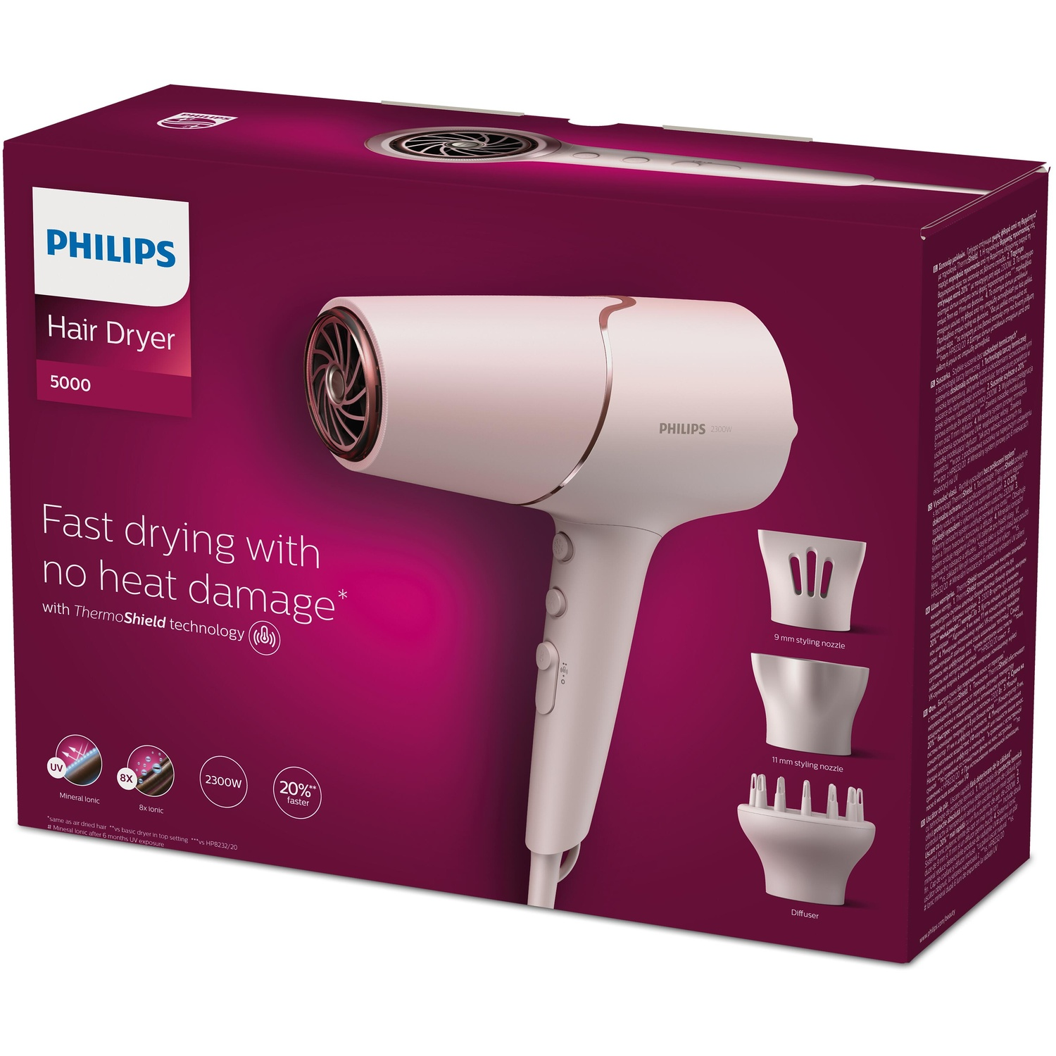 Een witte Philips haardroger met gouden accenten op de doos.